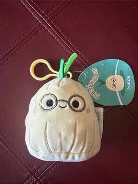 Squishmallows Isolde Clip-On Plush - Beige with Green Stem & Yellow 3 1/2”Clip